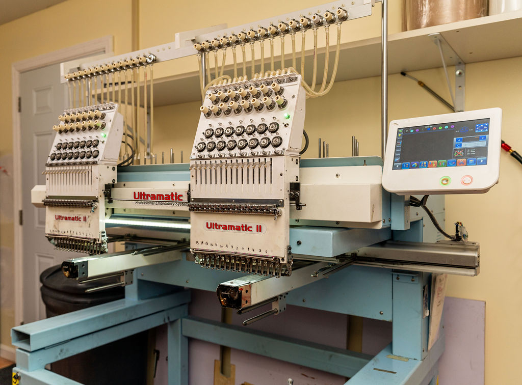 Multi-head embroidery machine at Hilson Ink